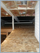 Platform and storage from the east wall facing west.